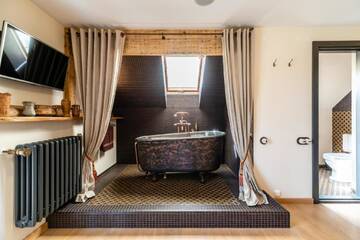 Фото номера Двухместный номер Делюкс с 1 кроватью и ванной Отель Boutique Hotel Bersas г. Turaida 2